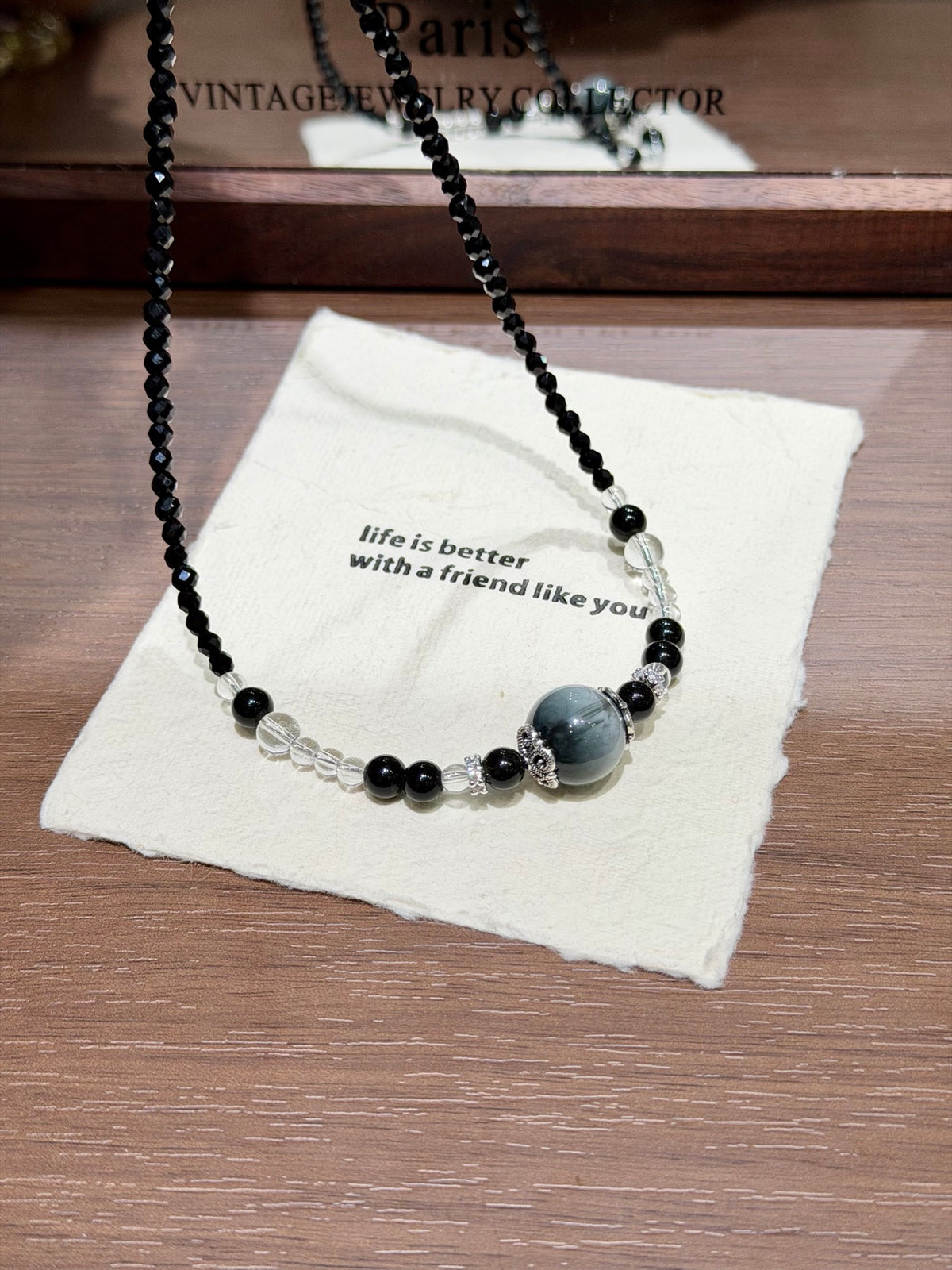 Night Hawk's Eye Necklace laid on cloth