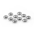 Ten silver stainless steel flat abacus stopper beads arranged on white background