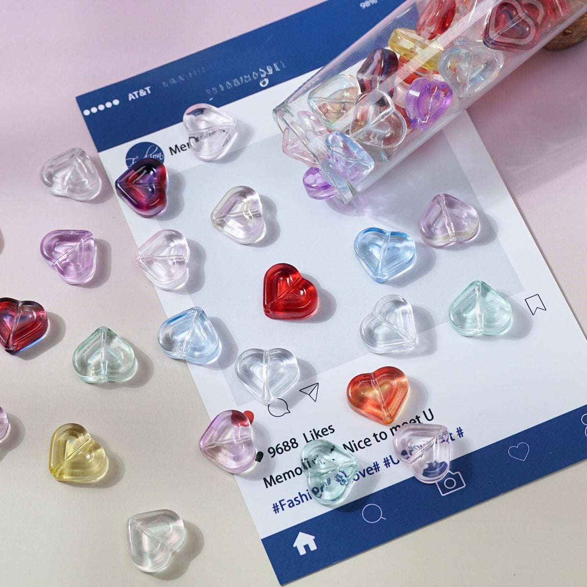 Heart-shaped translucent double-layer glass beads in red, purple, blue, green, yellow and clear on a printed card