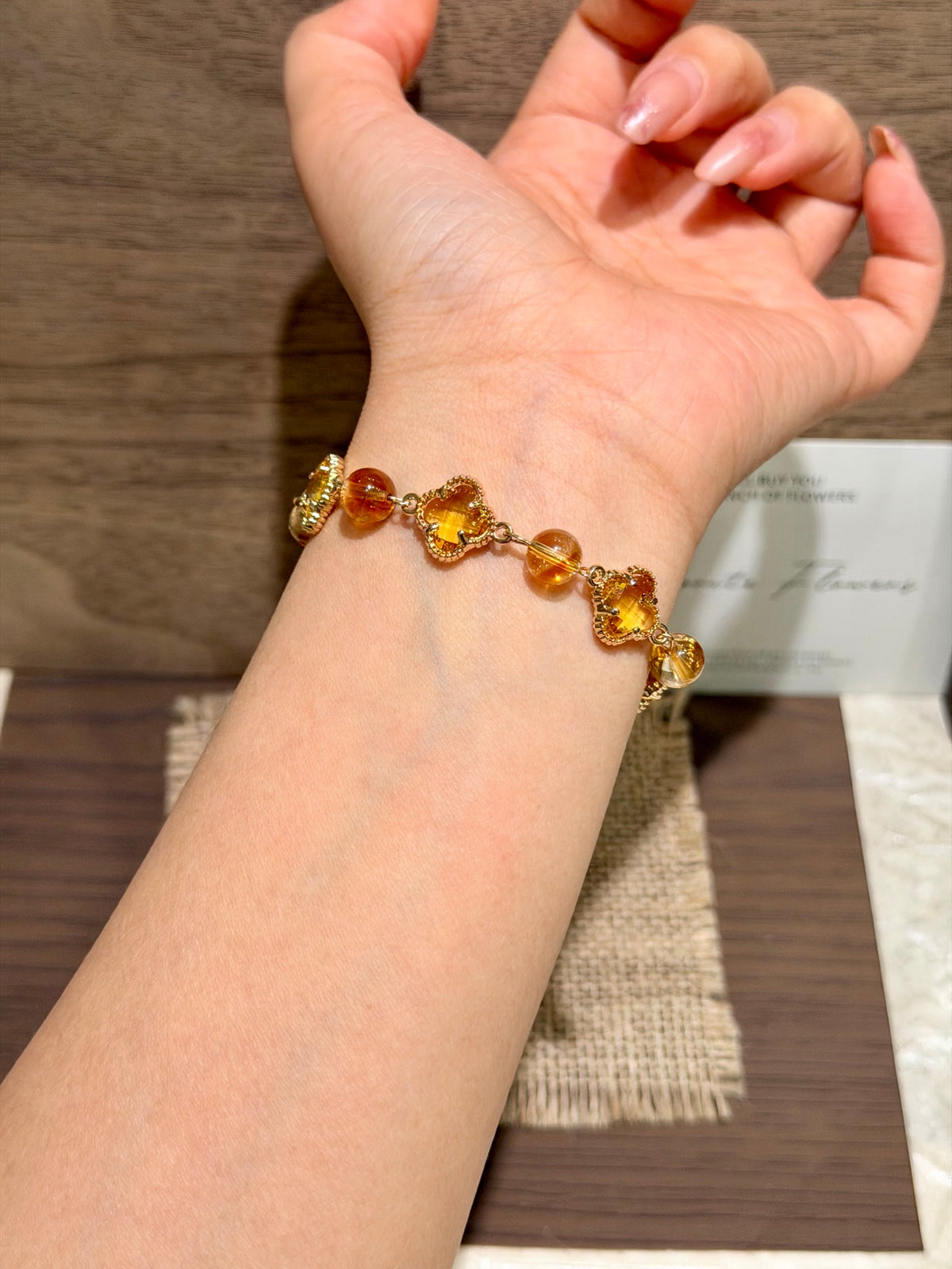 Golden Fortune yellow tower crystal four-leaf clover bracelet on wrist