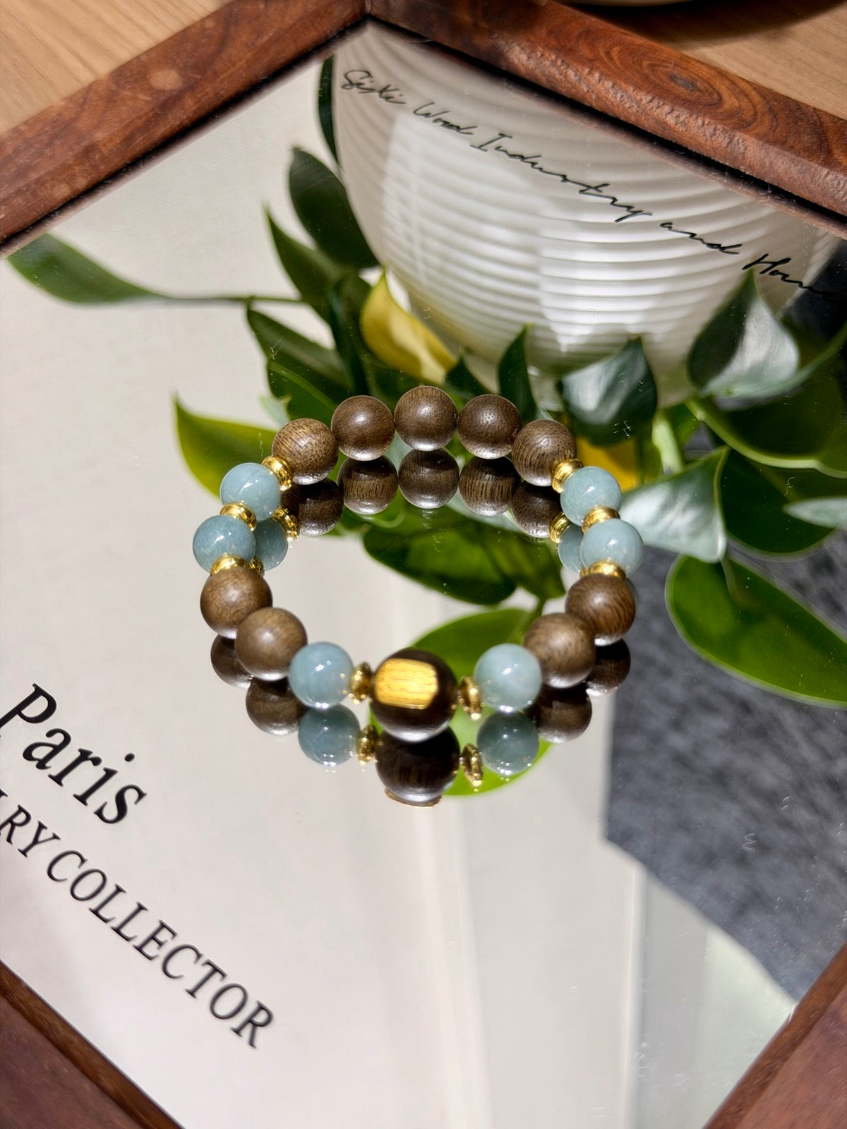 Blue Water Jadeite & Sandalwood Bracelet on mirror tray