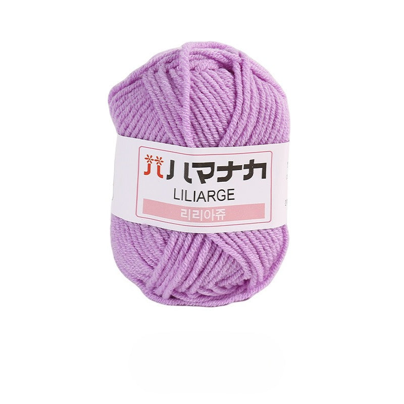 Taro purple 4-ply milk cotton-acrylic yarn skein with white LILIARGE label on white background