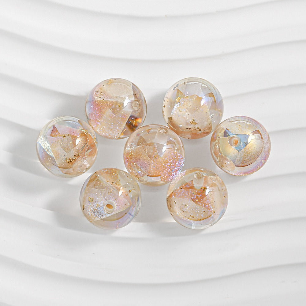 Seven iridescent resin beads with gold glitter and silver foil