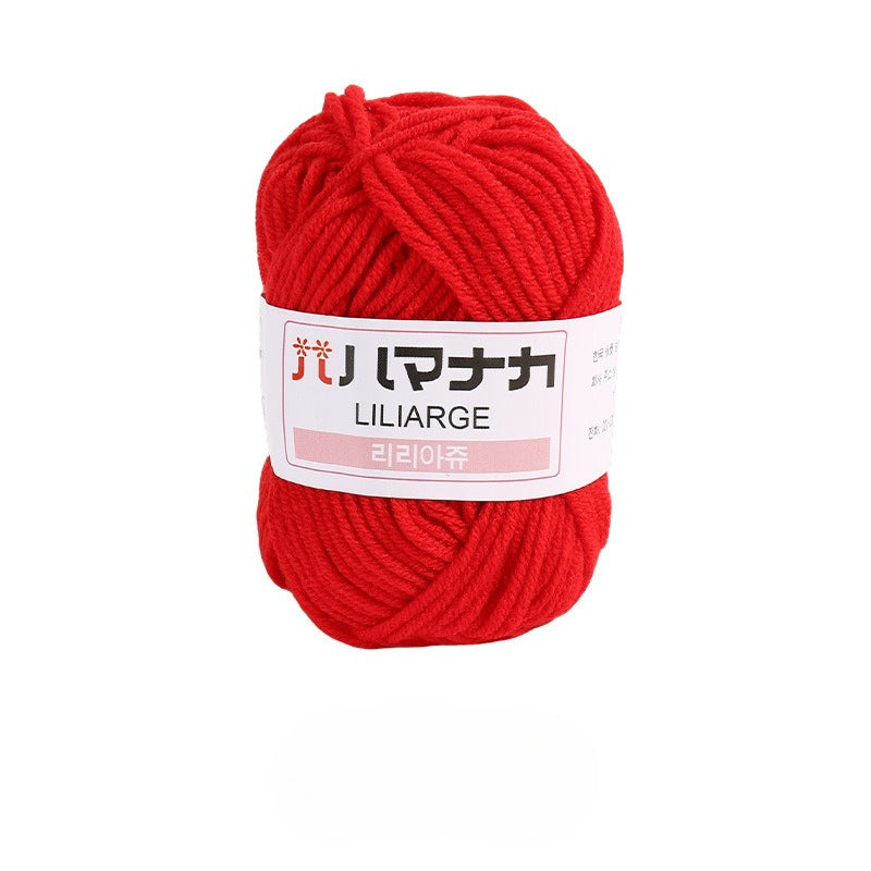 Bright red 4-ply milk cotton-acrylic yarn skein with white LILIARGE label on white background