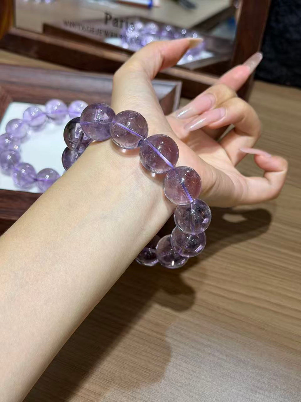 Bolivian amethyst bracelet worn on wrist