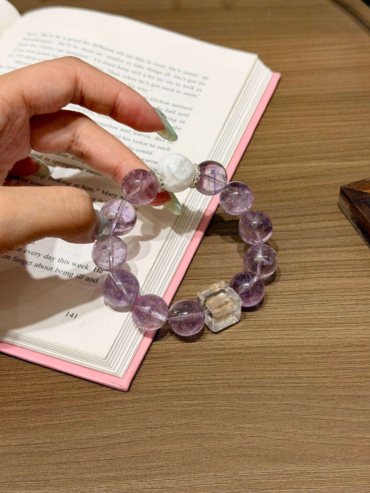 Purple mist snow bracelet with Bolivian amethyst worn on wrist