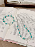 Amazonite & Azeztulite Necklace Bracelet Set on open book