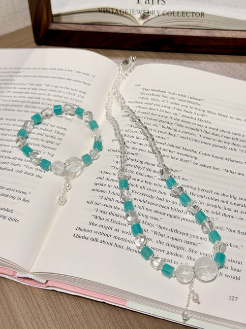 Amazonite & Azeztulite Necklace Bracelet Set on open book