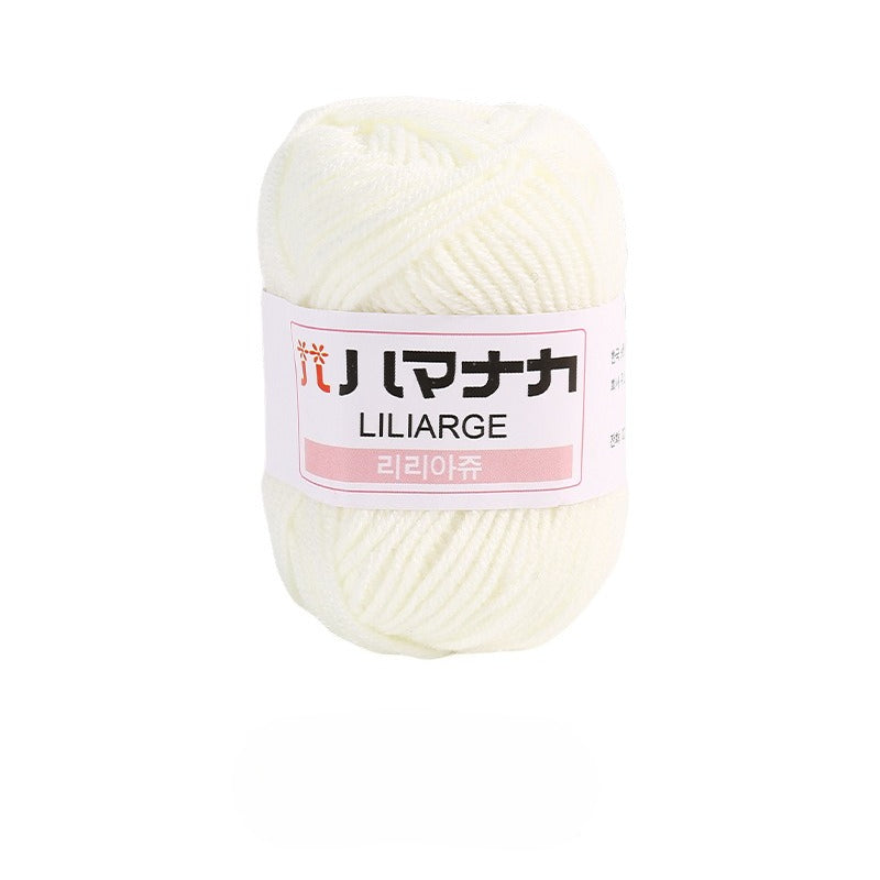 Milky white 4-ply milk cotton-acrylic yarn skein with white LILIARGE label on white background