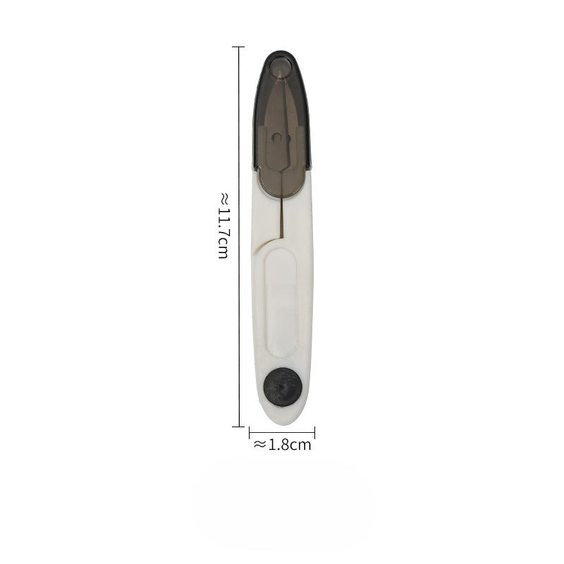Black and white spring-loaded thread snip shown vertically with dimension lines