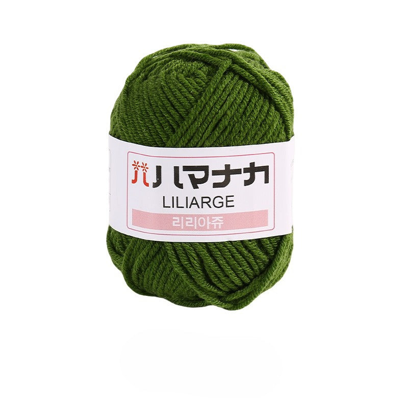 Autumn green 4-ply milk cotton-acrylic yarn skein with white LILIARGE label on white background
