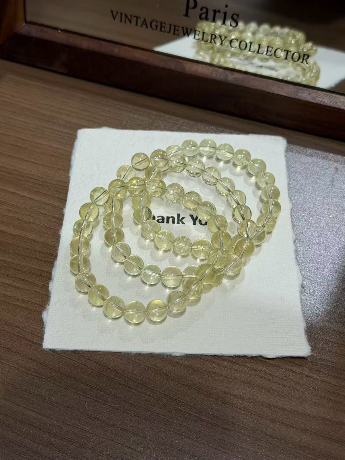 Lemon citrine plain strand bracelet worn on wrist