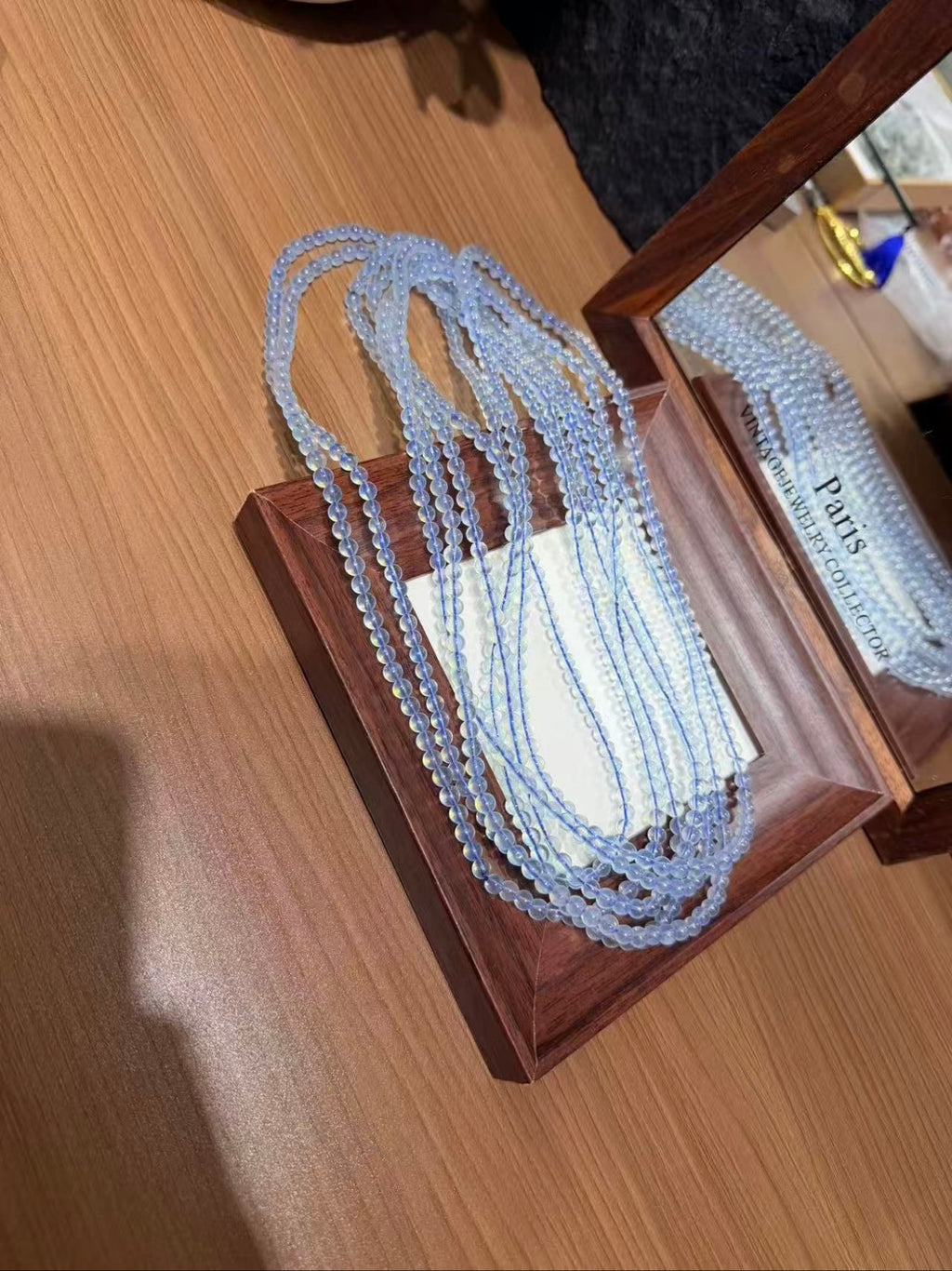 Aquamarine Triple Wrap Bracelet strands in tray