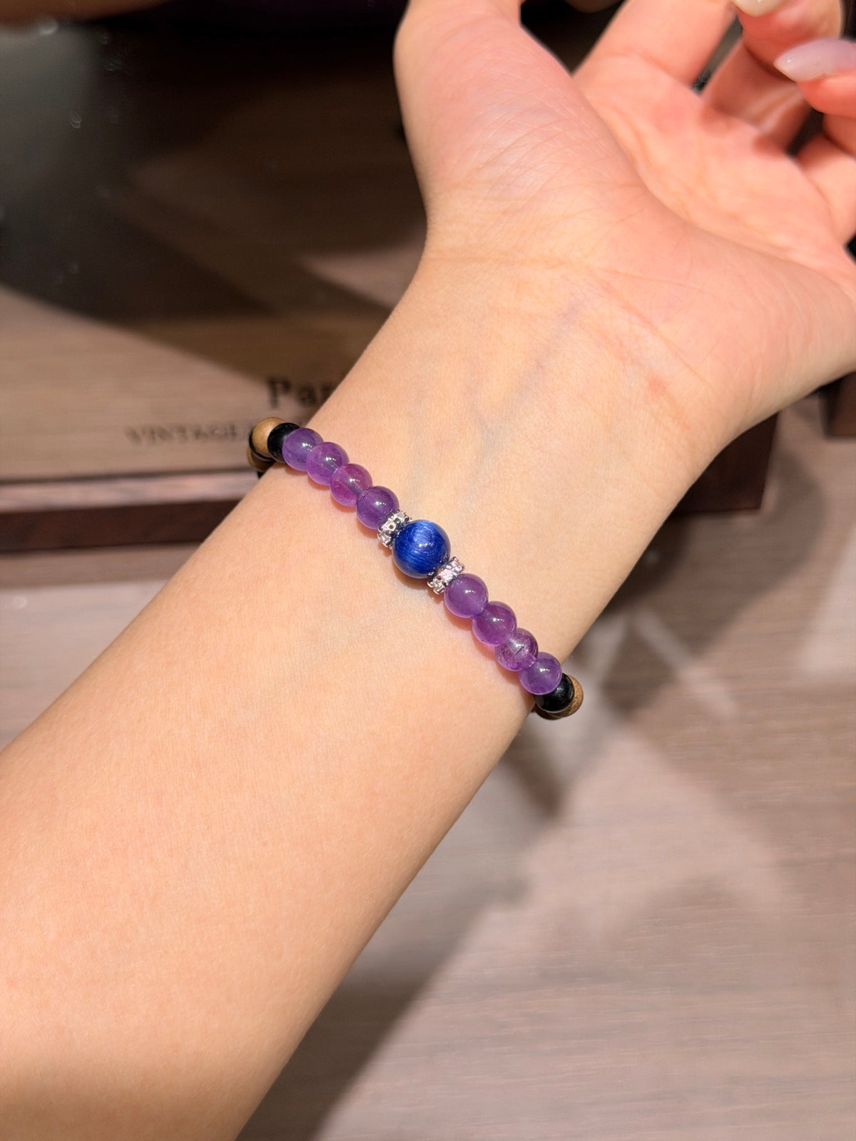 Dusk mountain amethyst sandalwood bracelet with kyanite worn on wrist