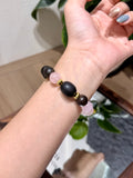 Pink Quartz & Agarwood Bracelet worn on wrist