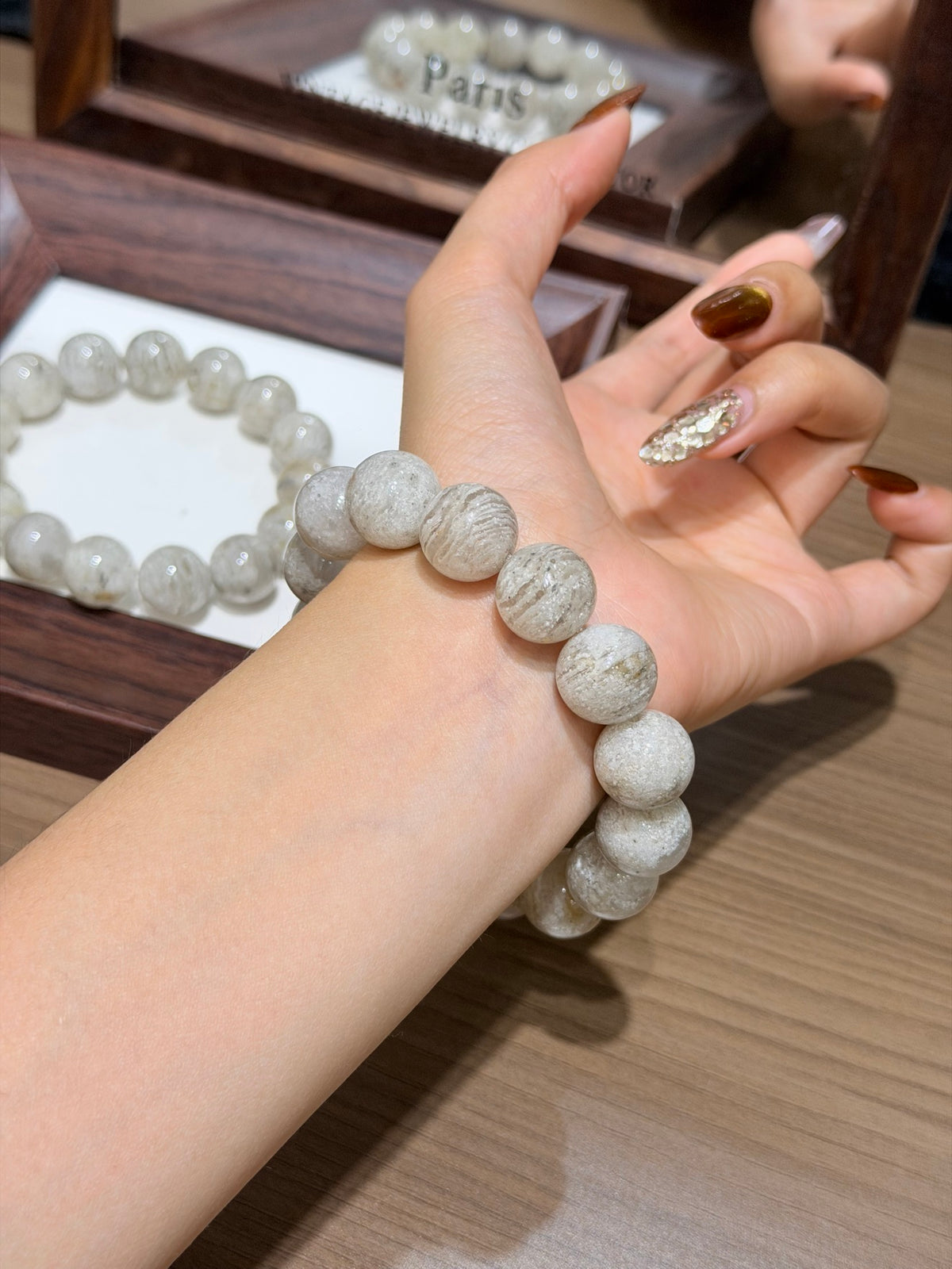 Thousand-Layer Phantom Quartz Bracelet worn on wrist