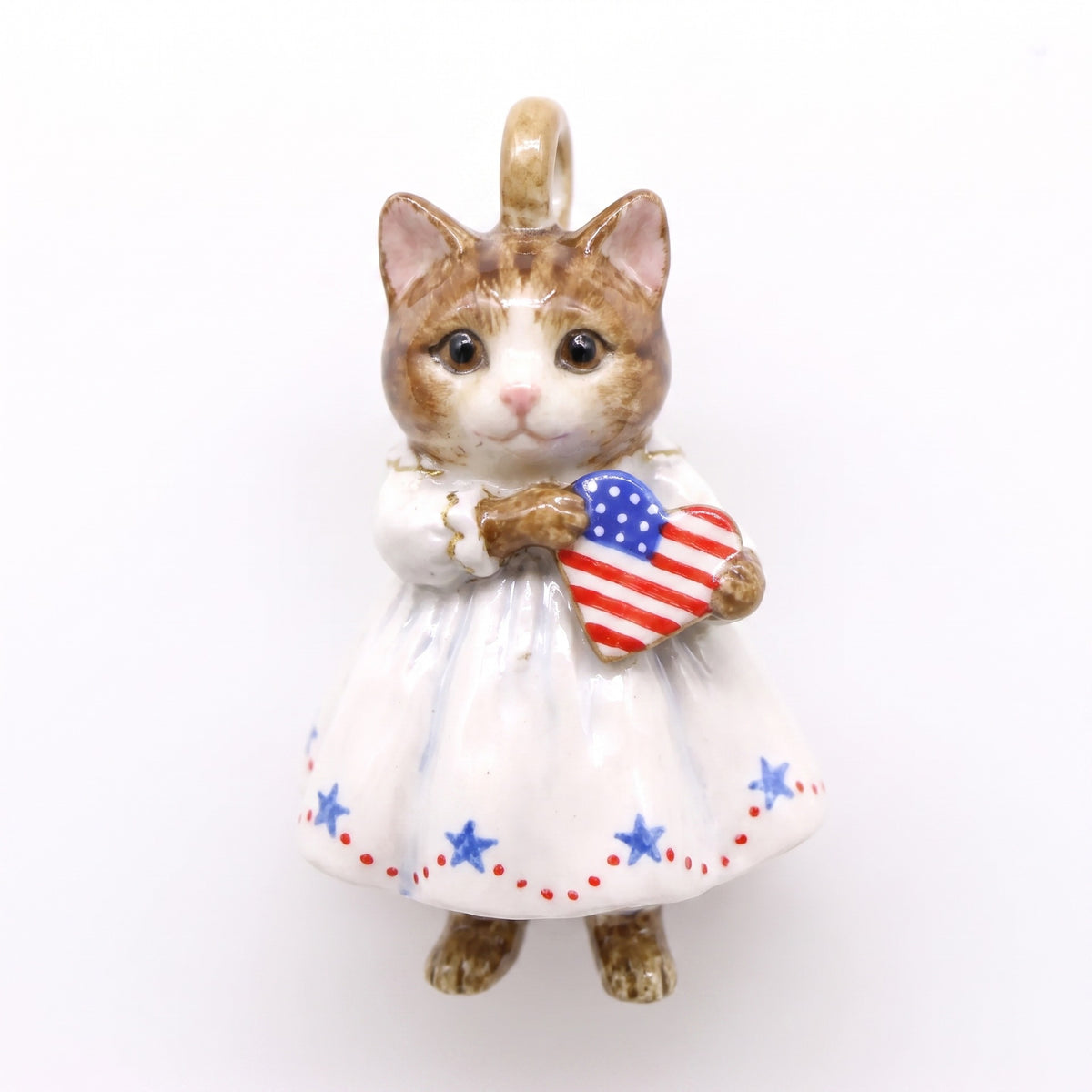 3D kitten pendant charm in white dress with blue stars, holding heart-shaped American flag.
