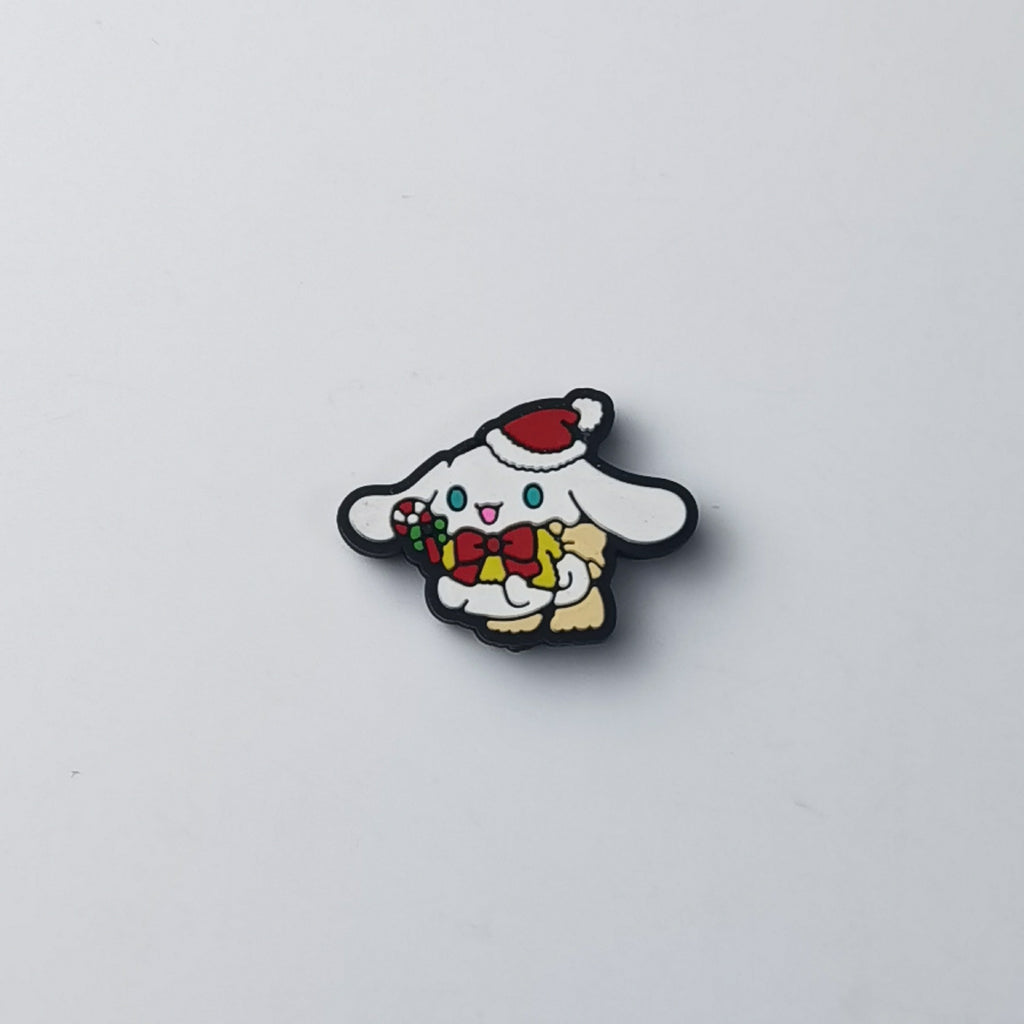 Cinnamoroll silicone focal bead in red Santa hat, holding a gift box with red bow