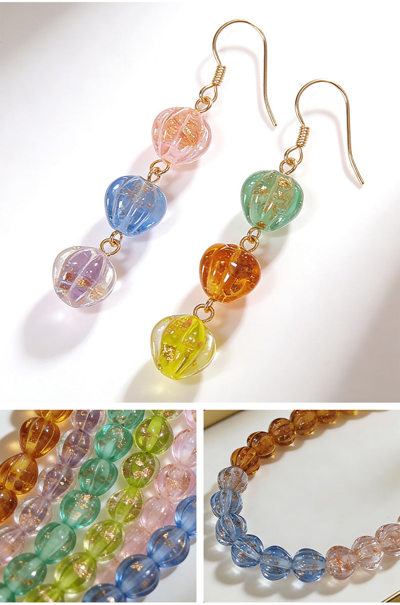 Drop earrings, bead strands, and bracelet made with colorful lantern glass beads