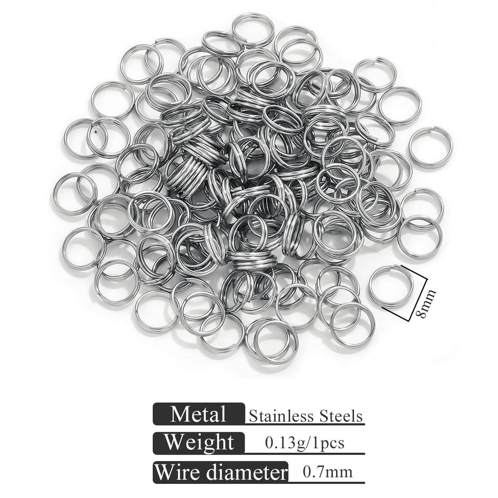 Small stainless steel split rings with 5mm size marker on white background