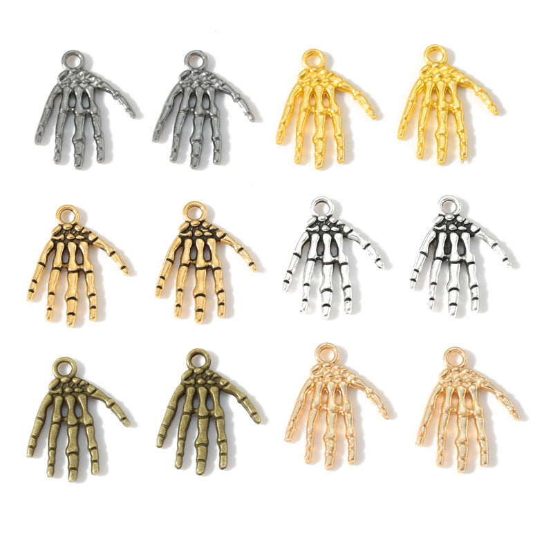 Collection of skeleton hand charms in various colors on a white background