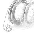 Two clear plastic spools wound with silver-tone stainless steel wire, loose coil in front, white background.