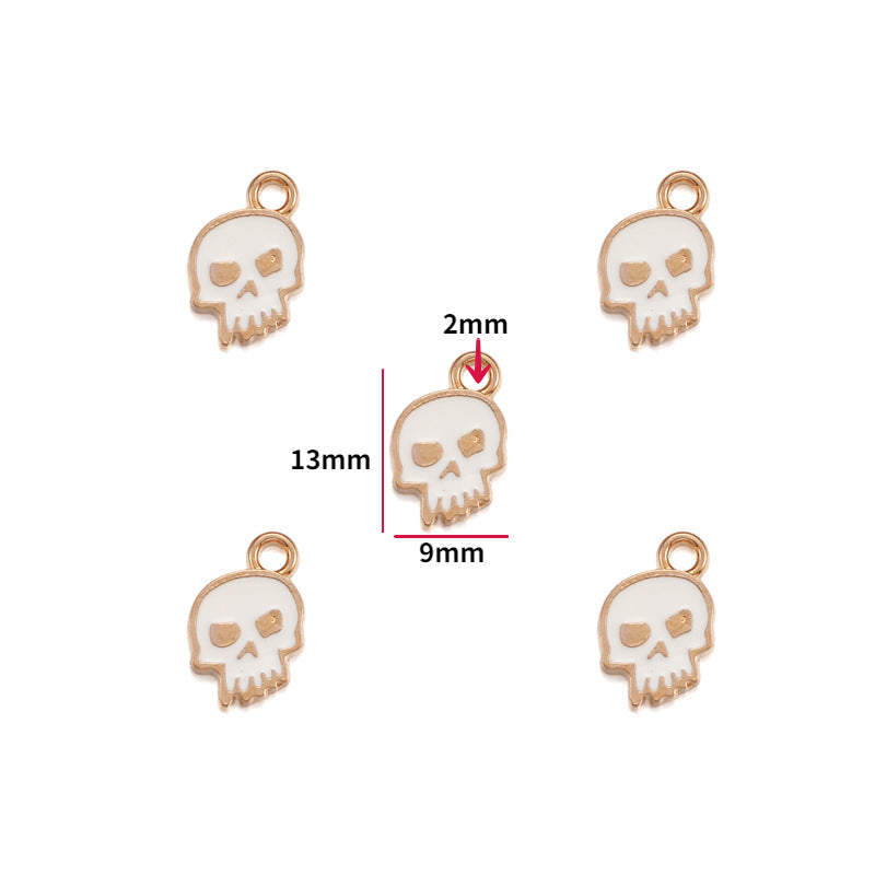 Five white enamel skull charms with rose gold outlines, 13mm