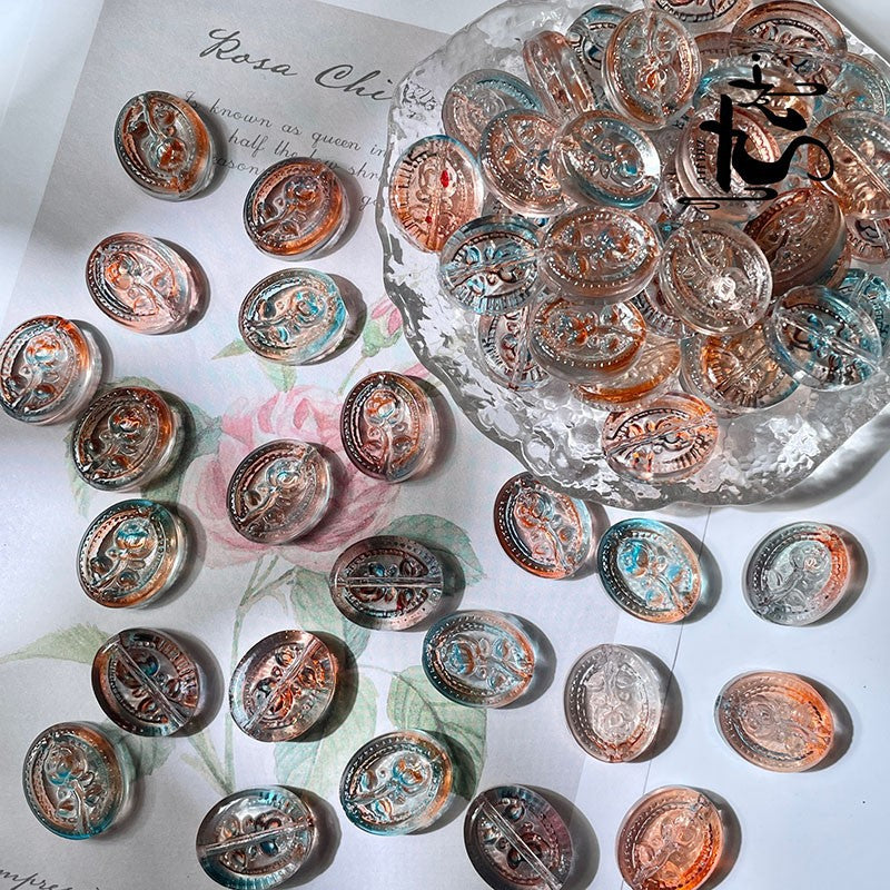 Oval engraved glass rose beads with vintage-style illustrations on white