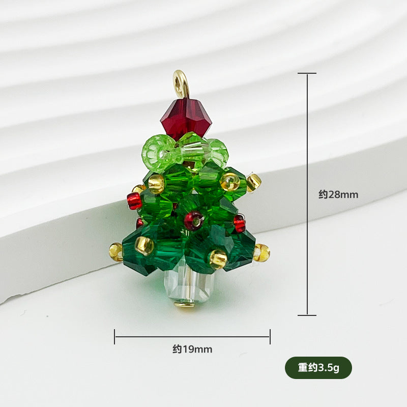 Christmas tree-shaped crystal pendant charm with green faceted crystals and a red crystal topper