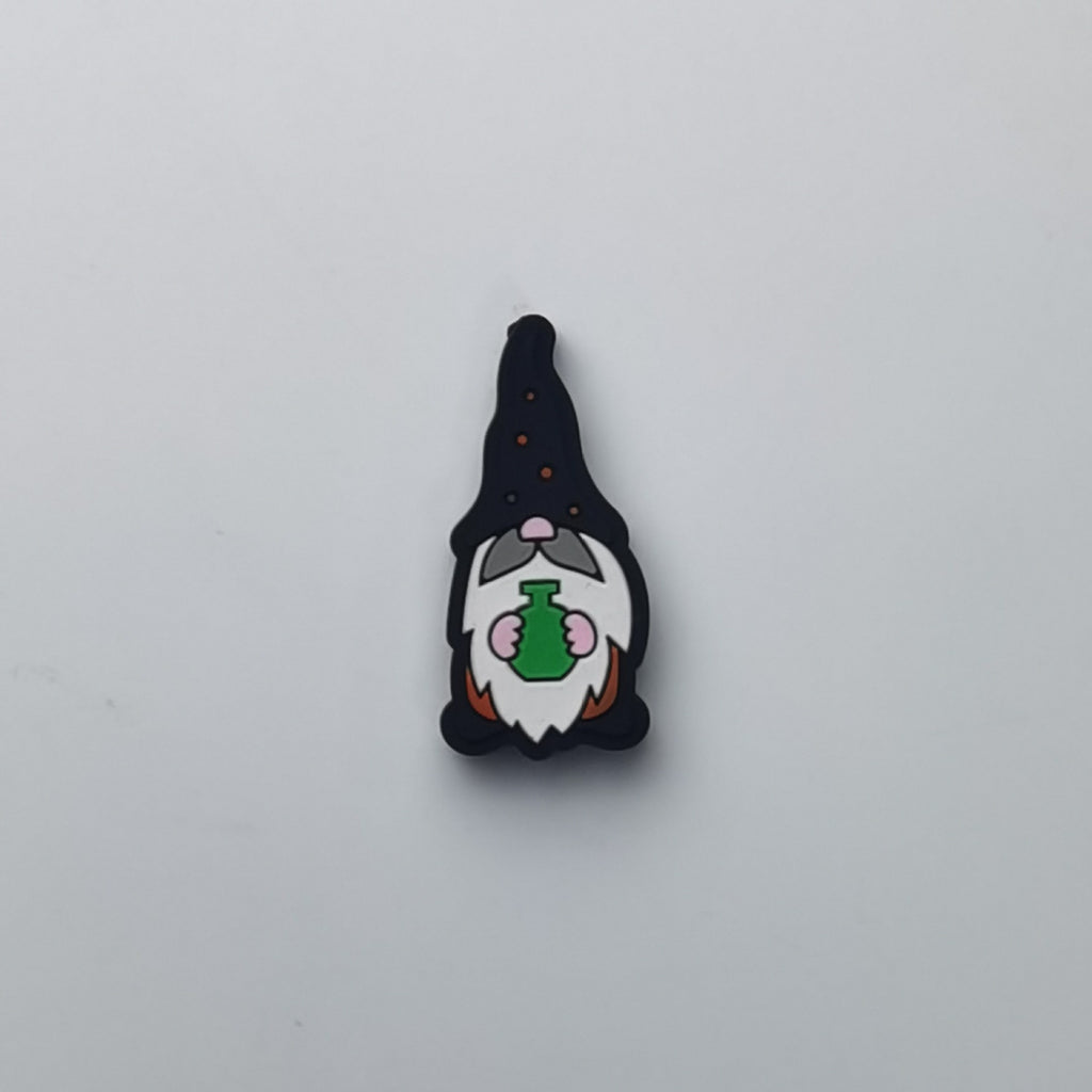 Gnome wizard silicone focal bead with black pointy hat, white beard, and green potion bottle