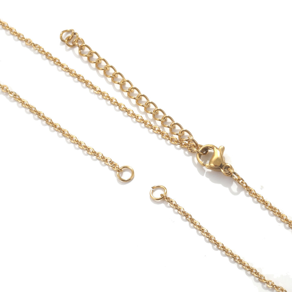 Two gold-tone stainless steel chain connector links with lobster clasps and double end rings on white background