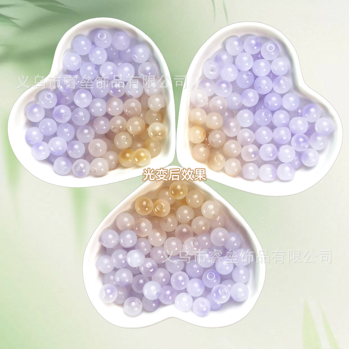 Three heart-shaped dishes of beads shifting from lavender to champagne gold