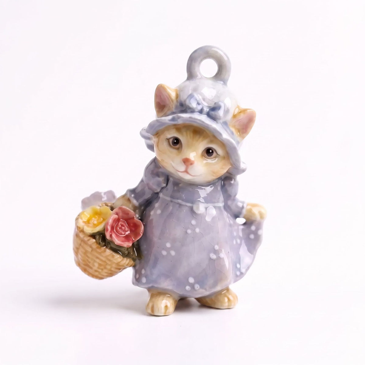 3D kitten pendant charm in lavender-gray bonnet and polka dot dress, holding flower basket.