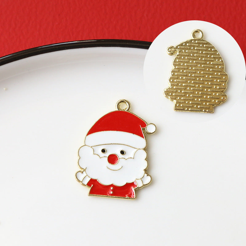 Christmas Santa Claus enamel alloy charm on white surface with red background