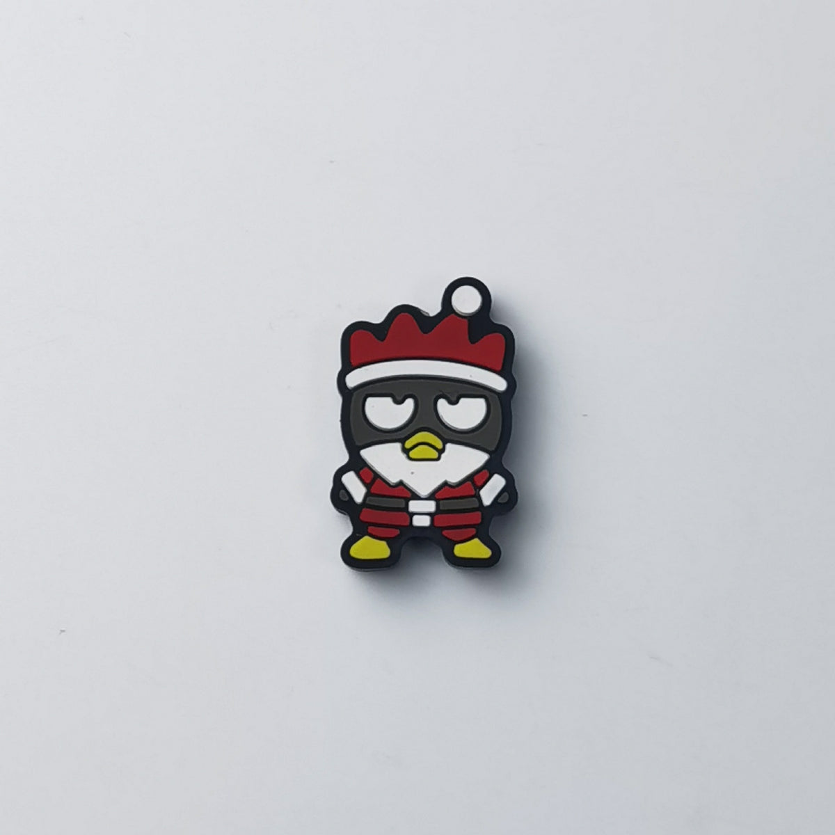 Cartoon penguin silicone focal bead dressed as Santa, in red Santa hat and red-and-white outfit