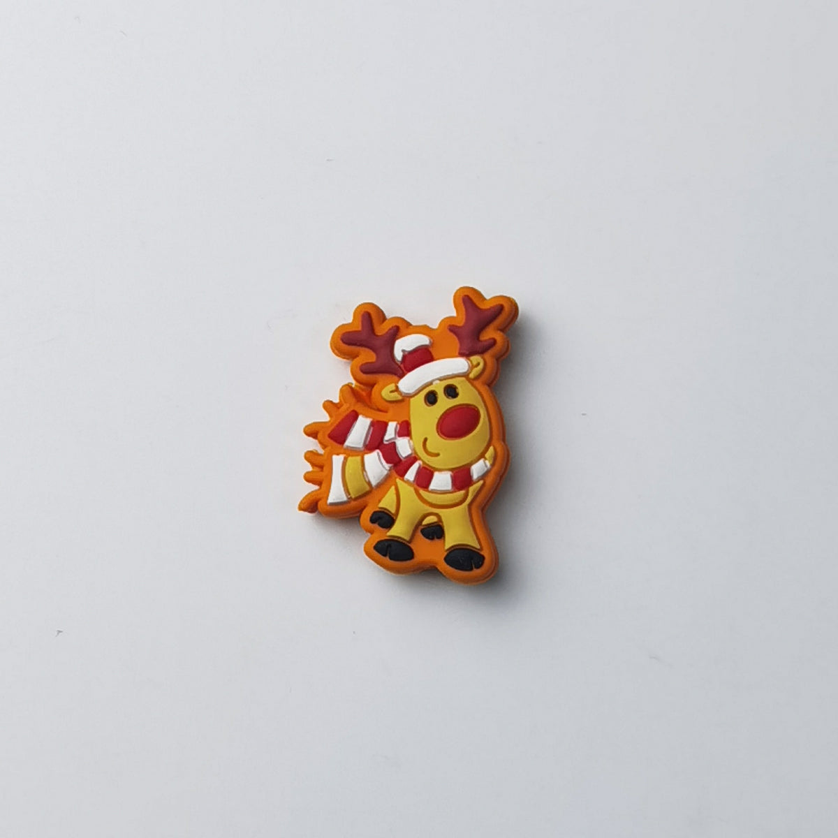 Cartoon reindeer silicone focal bead with red nose, wearing red-and-white striped scarf and Santa hat