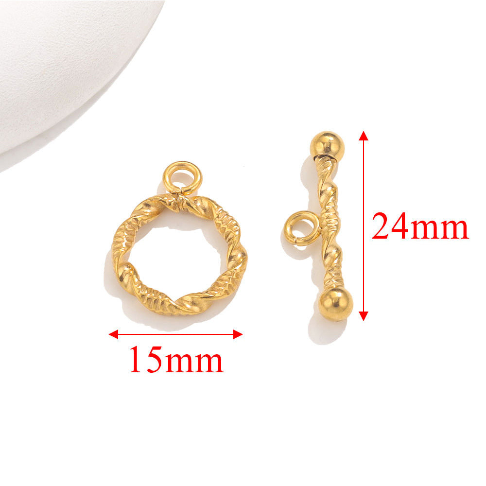Gold twisted toggle clasps with red dimension arrows showing 15mm and 24mm on white background