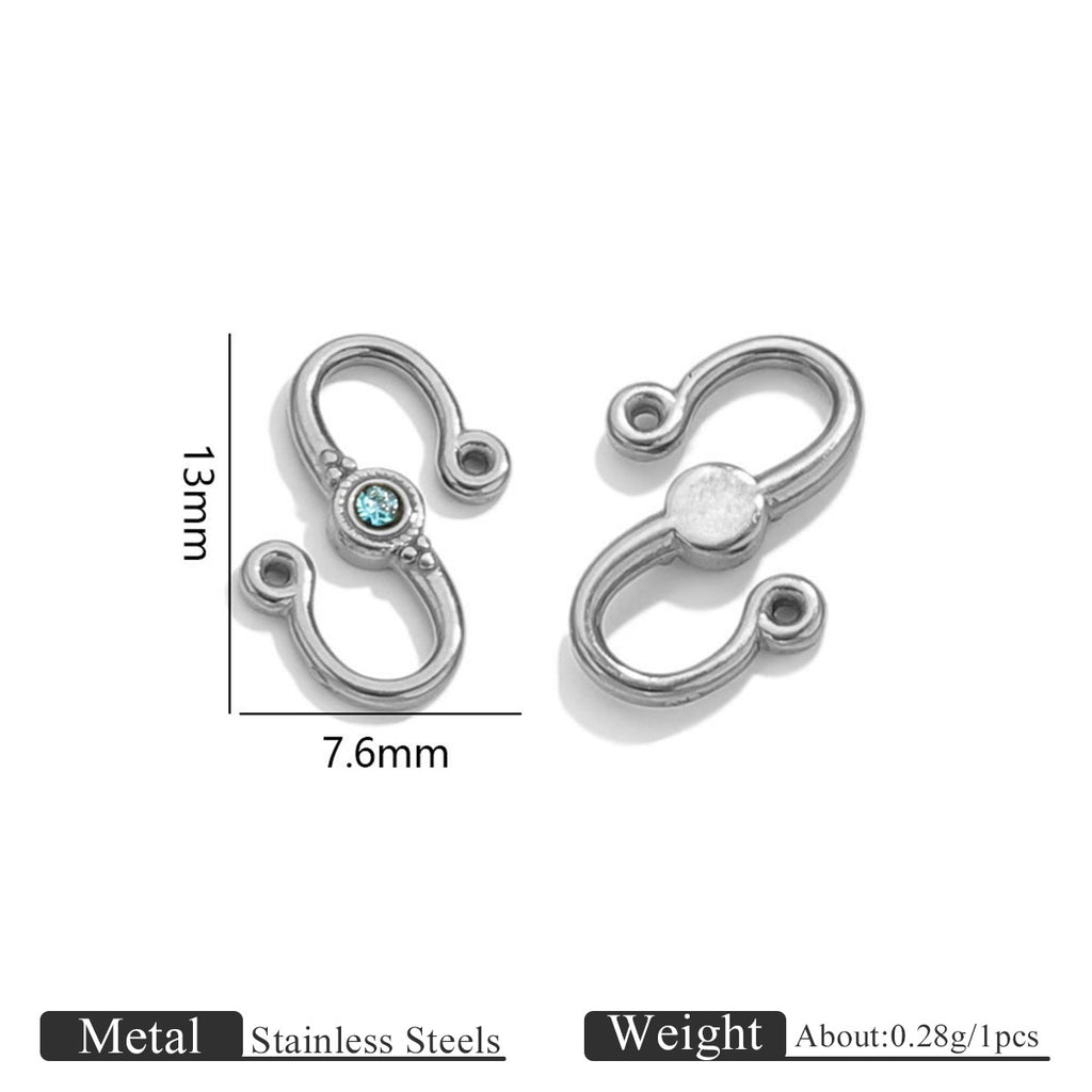 Two silver stainless steel S-hook clasps with blue stone, front and back views with 13mm by 7.6mm dimensions