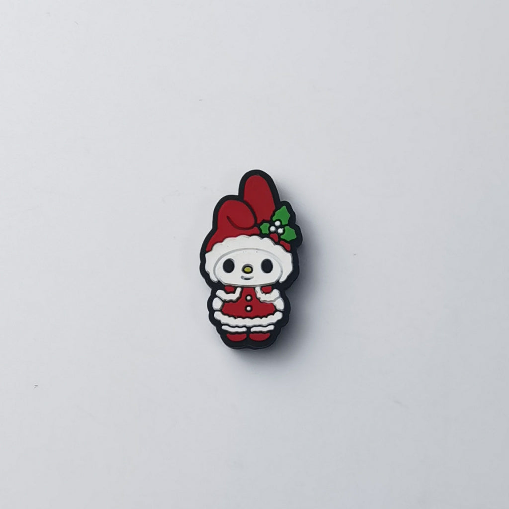 My Melody silicone focal bead in red Santa-style outfit with red hat and green holly leaves