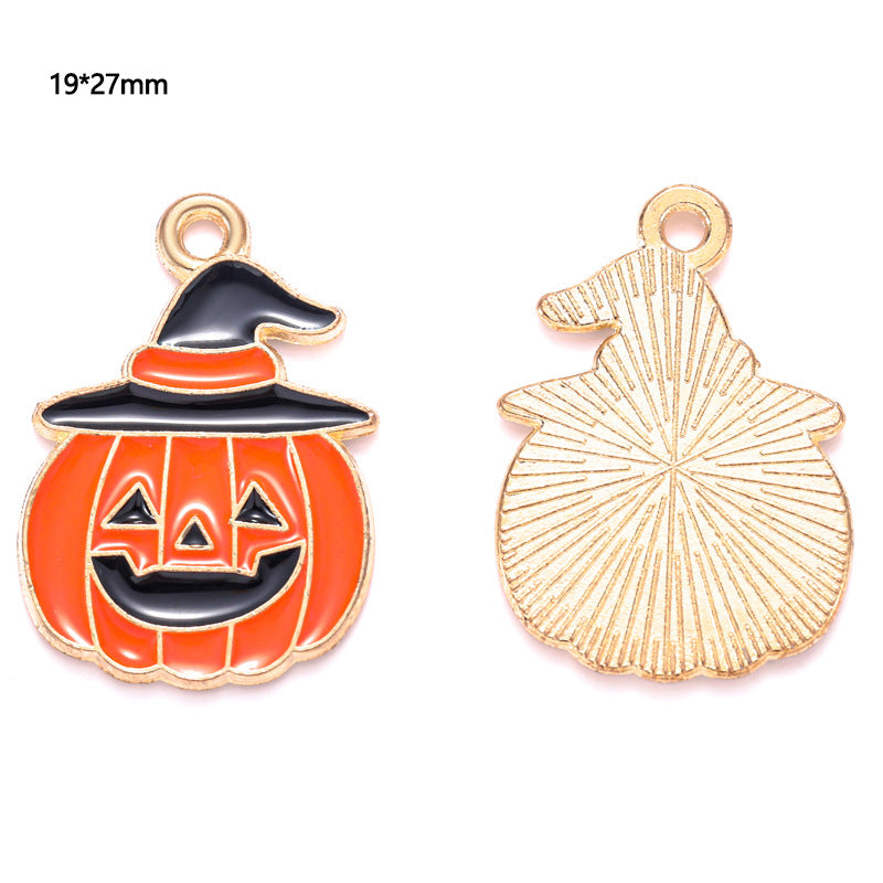 Two gold-tone pumpkin charms with witch hat, front and back, 19 by 27mm