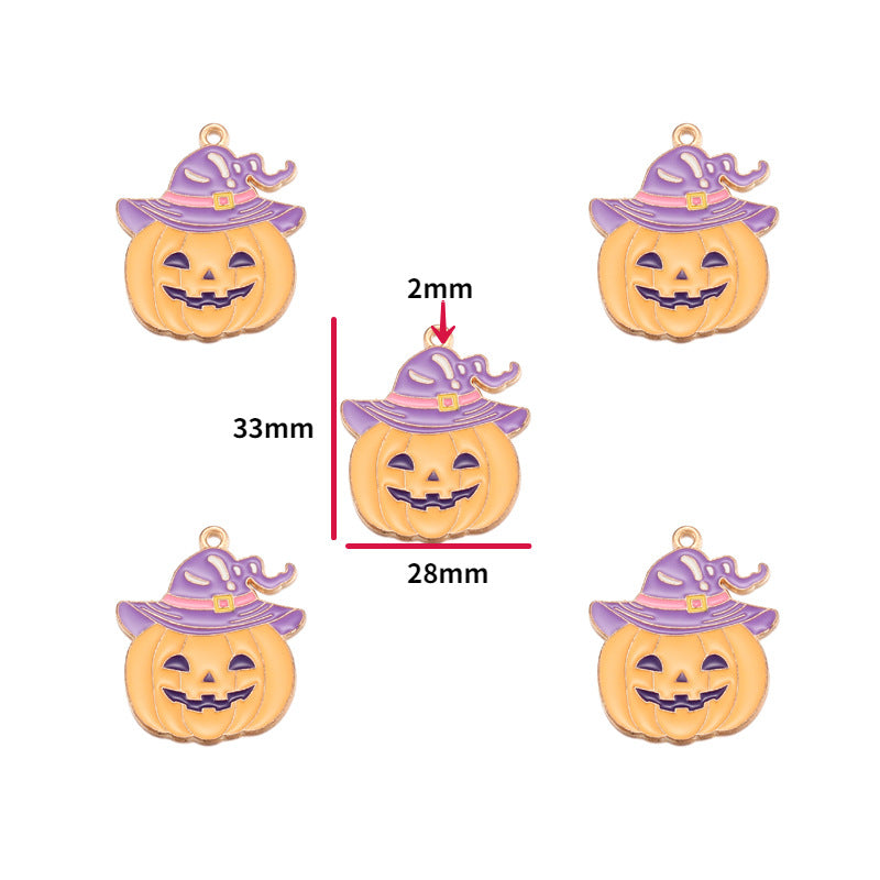 Five pumpkin-shaped charms with purple witch hats are shown on a white background, with one central charm annotated with dimensions: 33mm height, 28mm width, and 2mm top loop.
