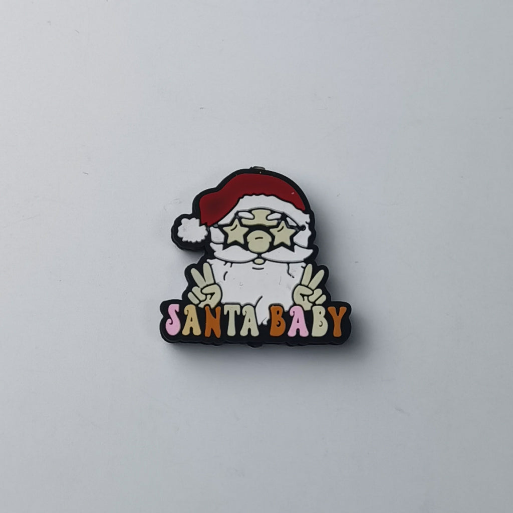 Santa Claus silicone focal bead with white beard, red hat and star glasses, making peace signs, 'SANTA BABY' text below
