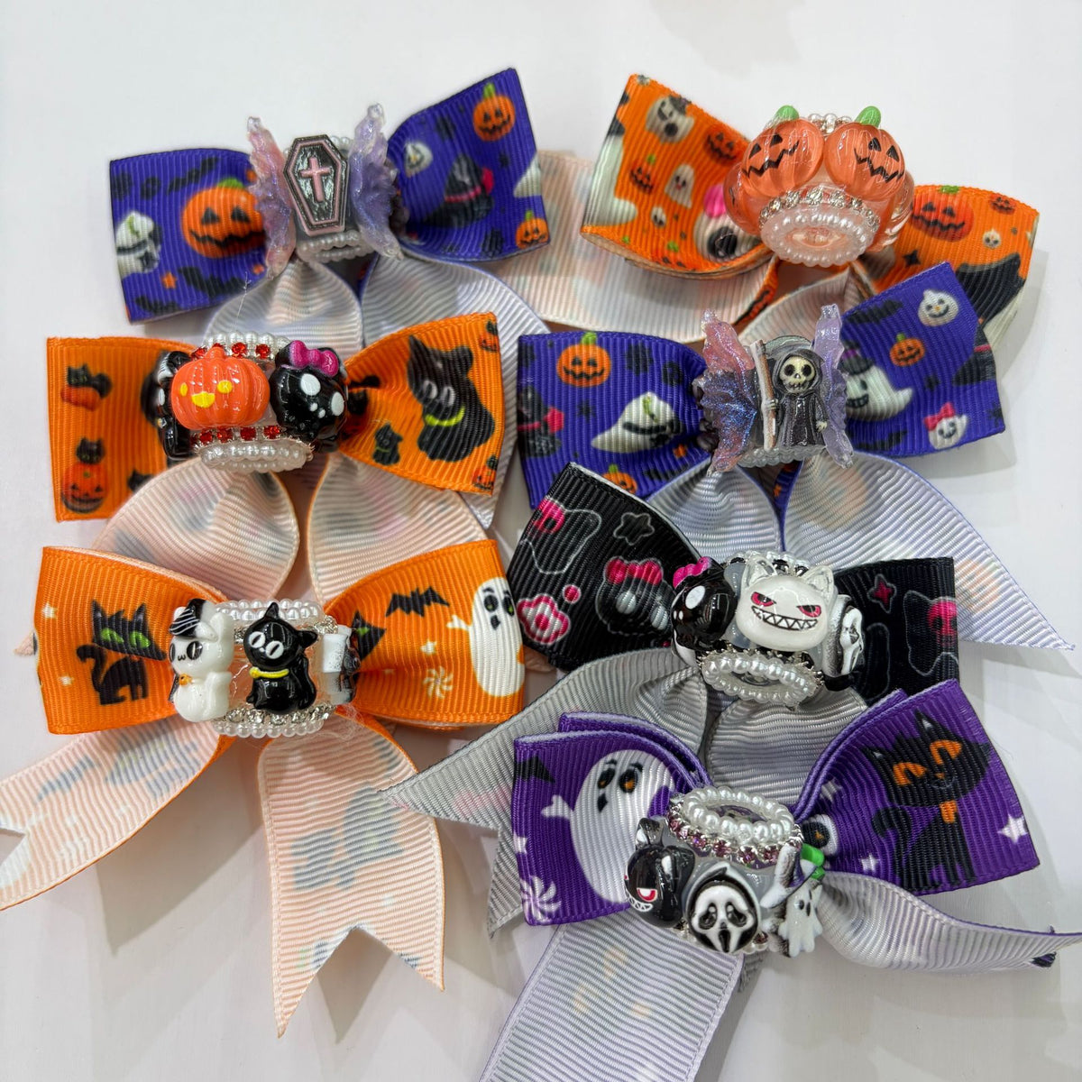 Six Halloween grosgrain ribbon bow focal beads with pumpkin, ghost, bat, and skull charms