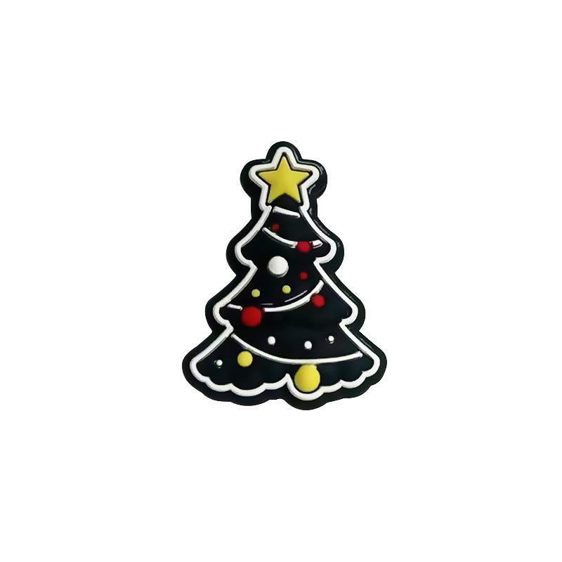 Black Christmas tree silicone focal bead with a yellow star and red-yellow decorative dots on white.