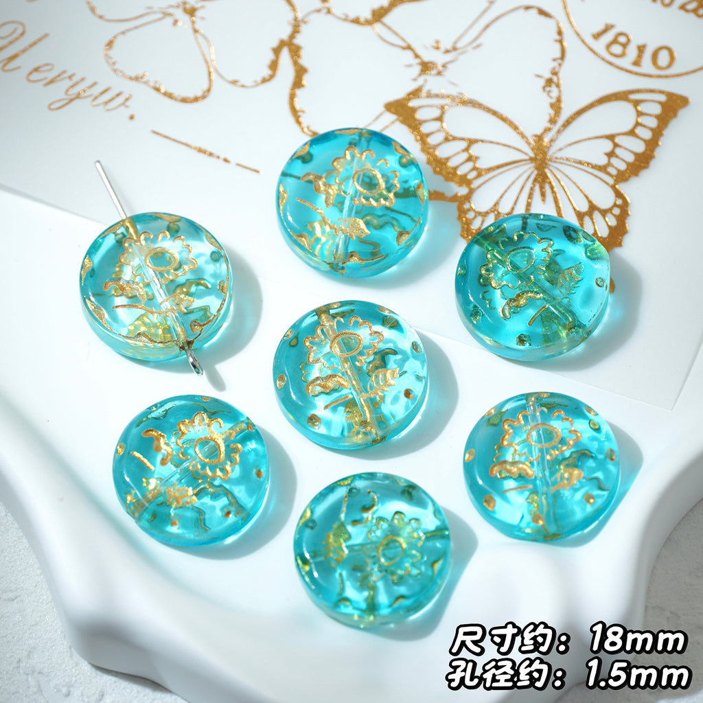 Emerald green 18mm gold-painted Czech-style glass sunflower beads