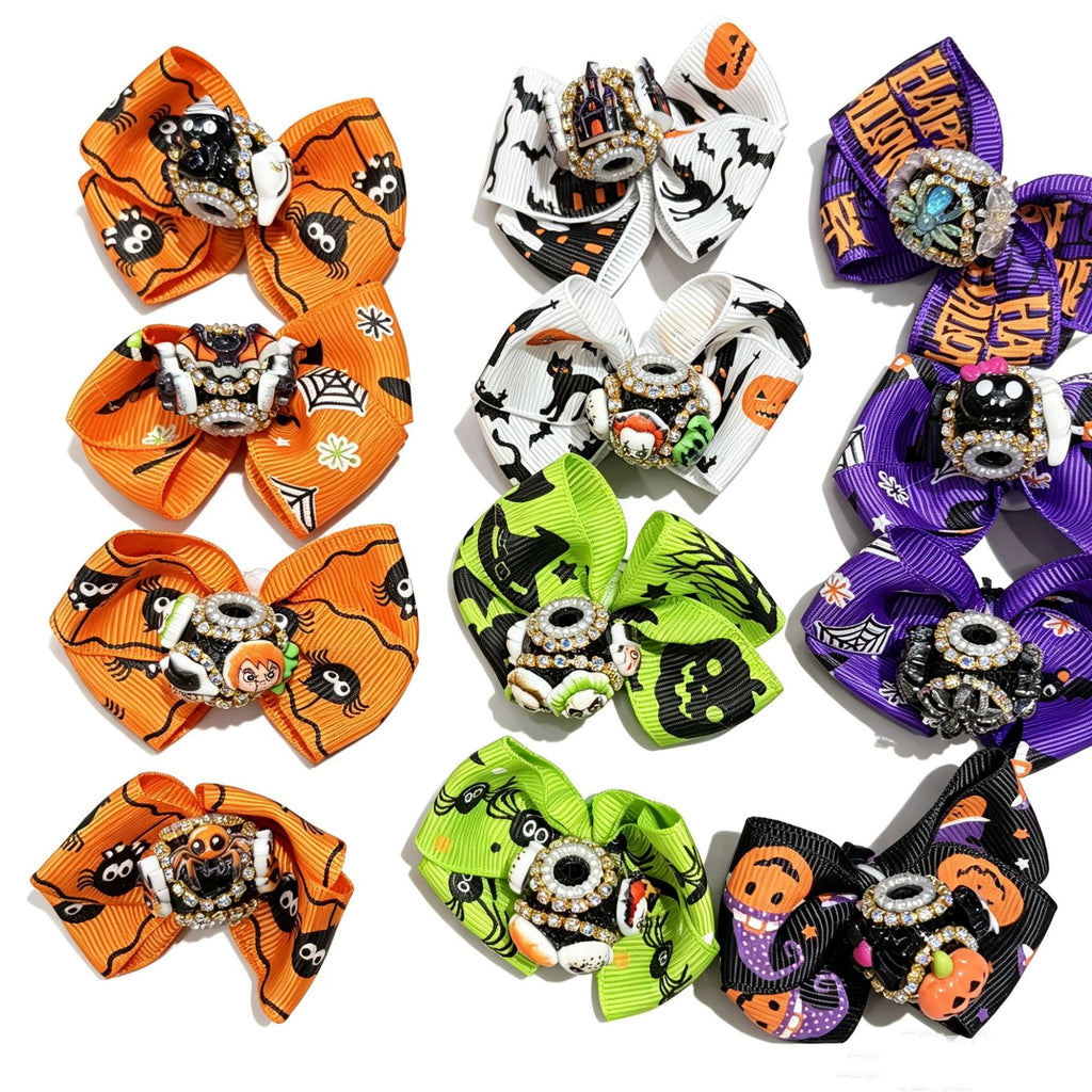 Grid of twelve Halloween ribbon bow focal beads on a white background