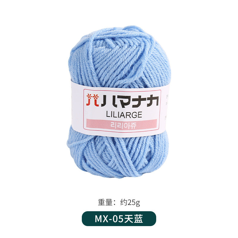 Sky blue 4-ply milk cotton-acrylic yarn skein with white LILIARGE label on white background
