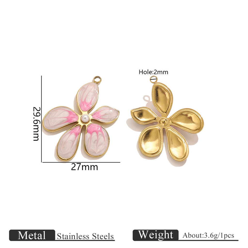 Two gold-toned flower pendant charms, one with pink and white enamel petals and pearl center, 29.6mm by 27mm