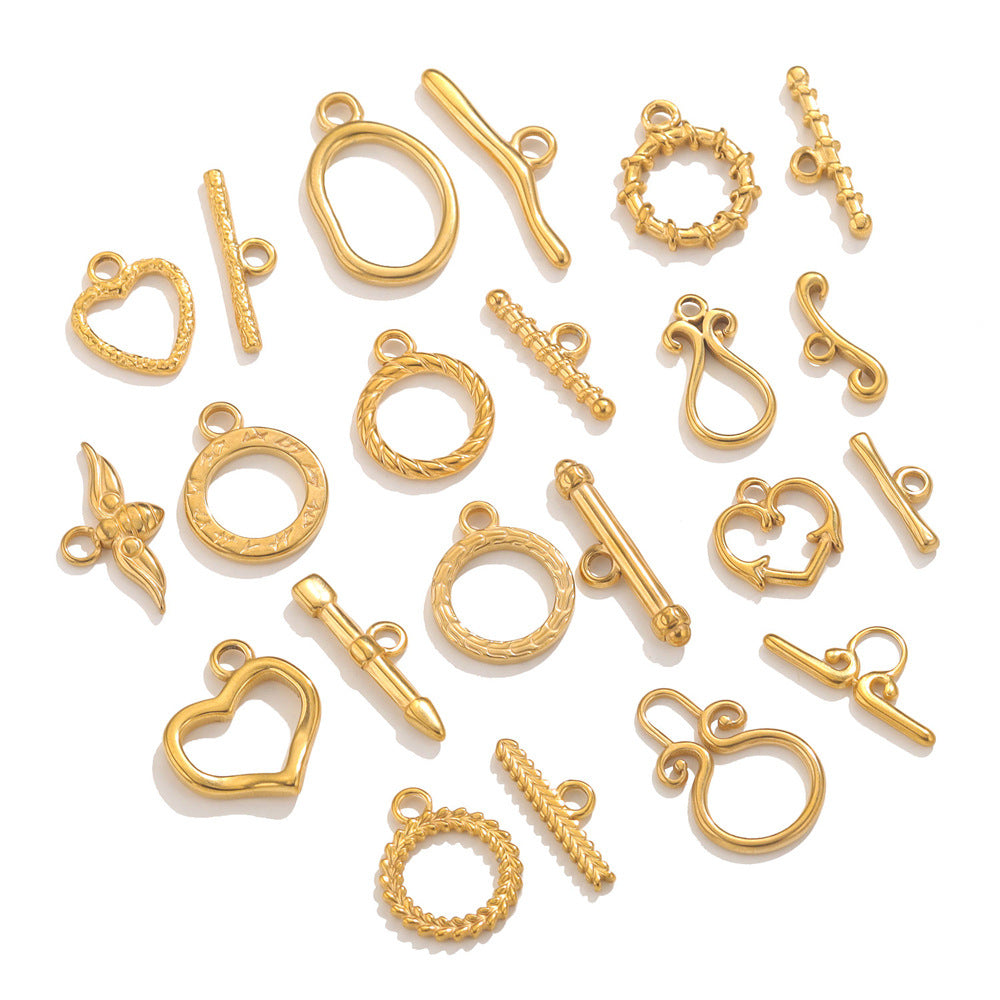 A set of 24 gold-tone jewelry findings and toggle clasps arranged on a clean white background.