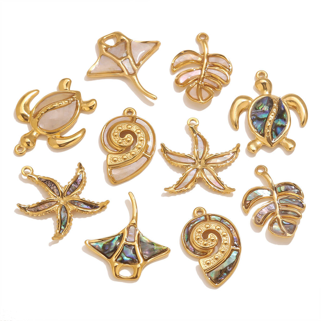 Collection of gold and multicolored pendants on a white background